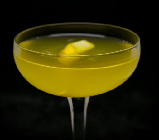 The cocktail itself in a chilled coupe and garnish with a lemon twist